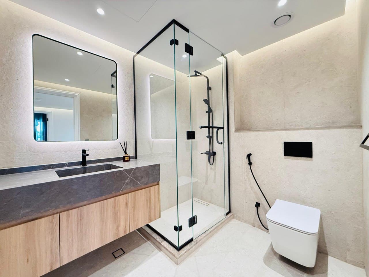 Modern bathroom with floating wood vanity